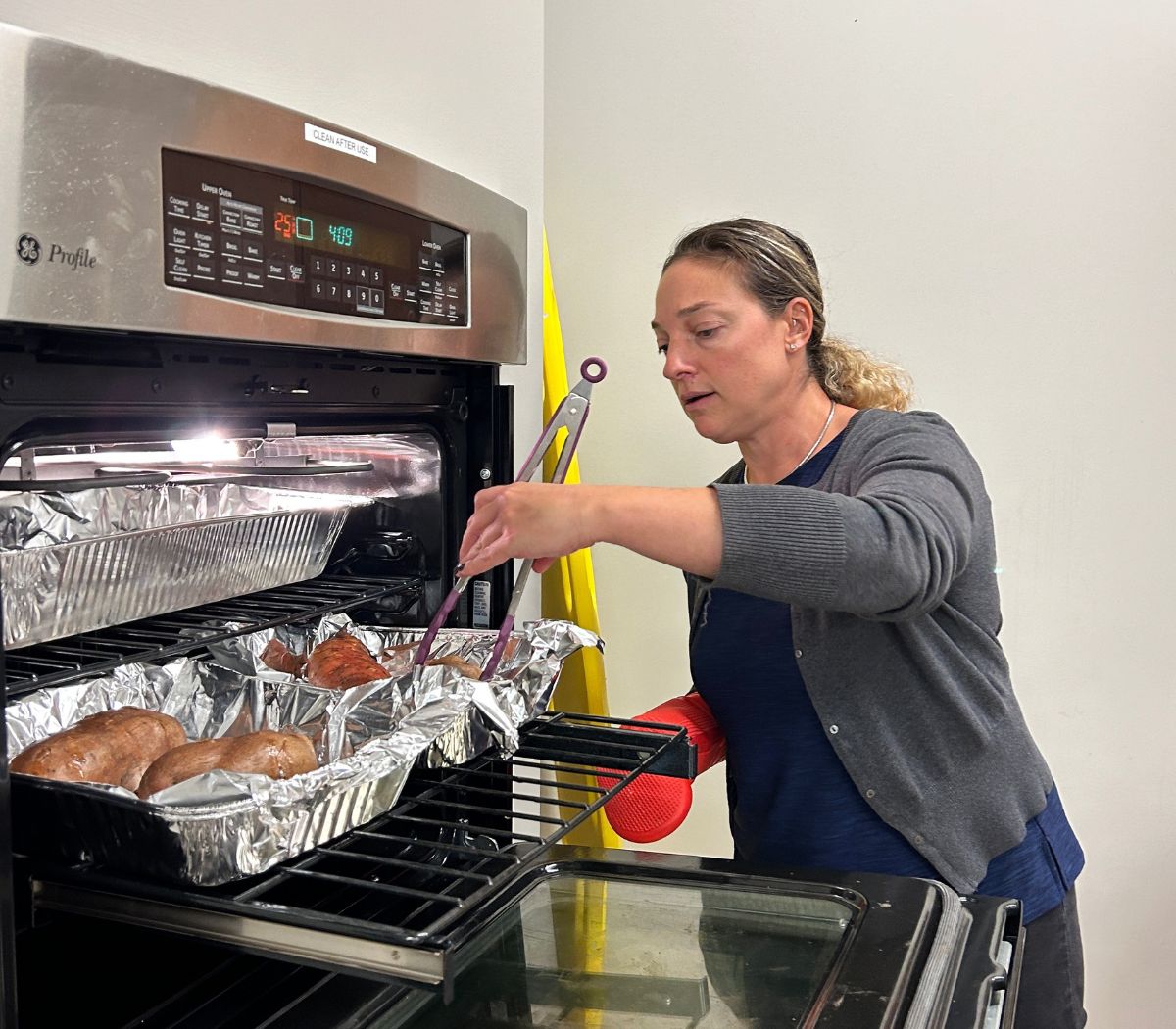A class watches a plant-based cooking demonstration