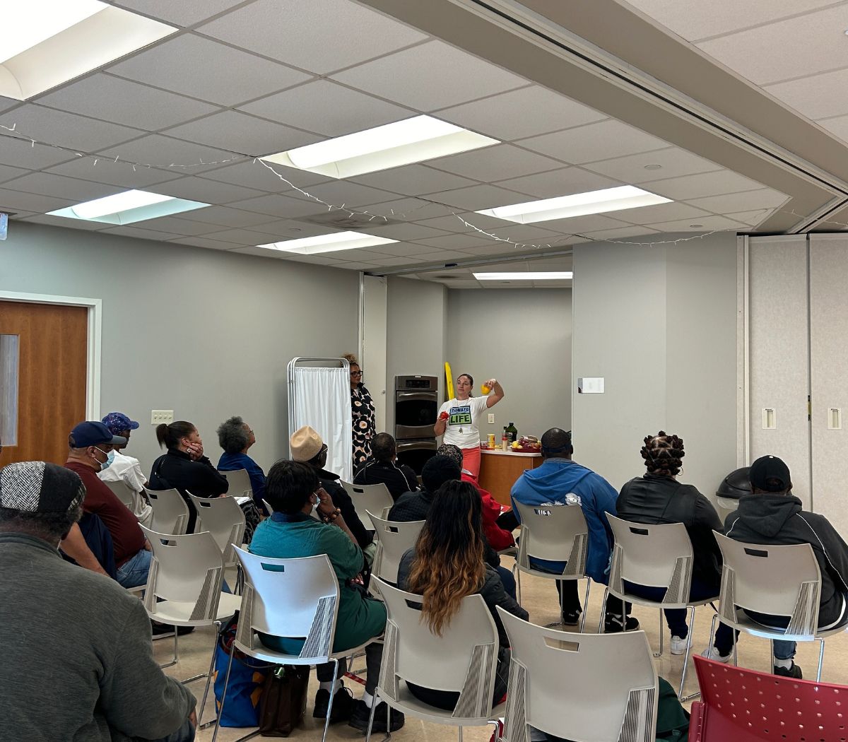 A presenter leads a nutrition class
