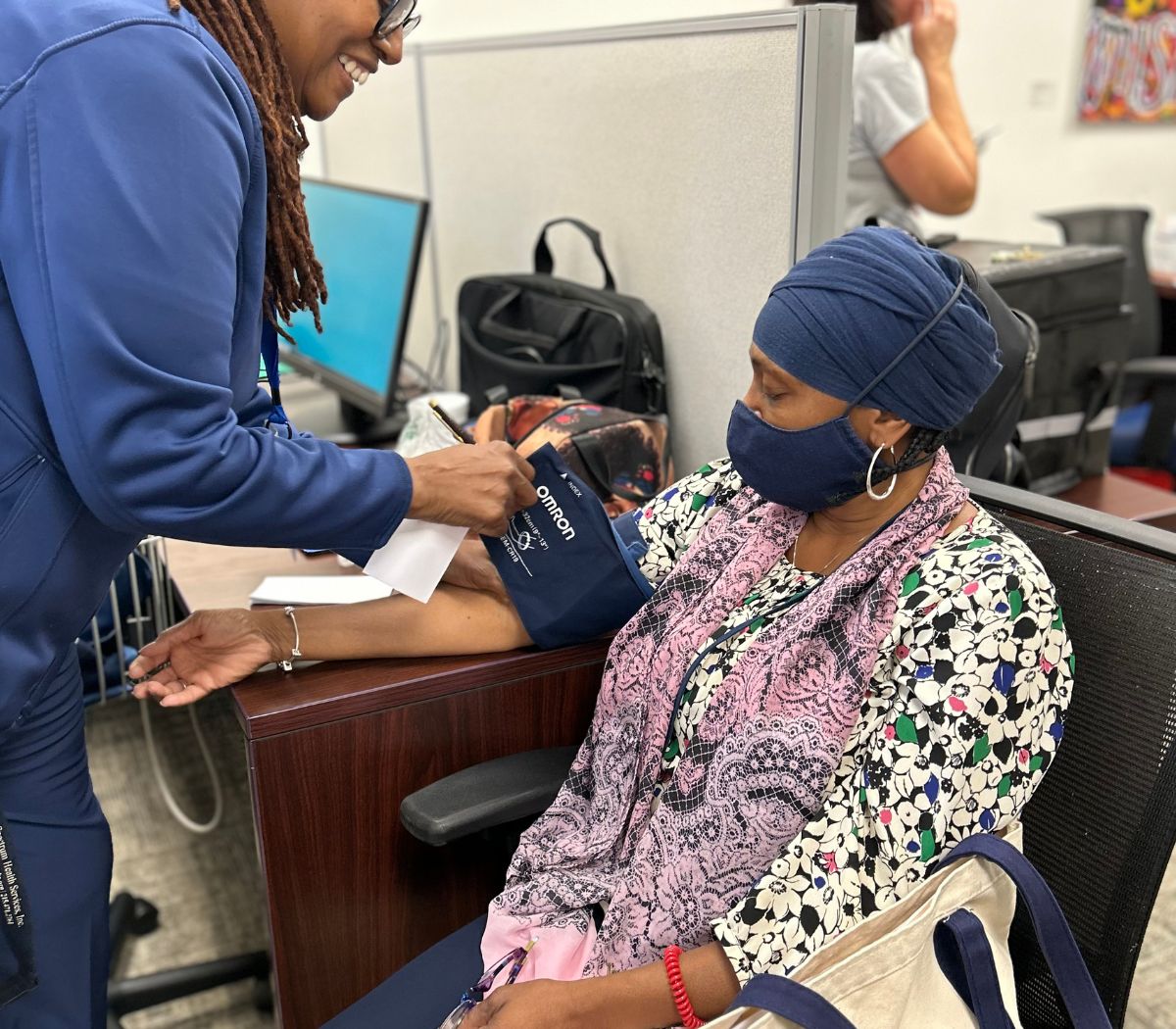 A community member gets a flu shot at the Community Fall Fest