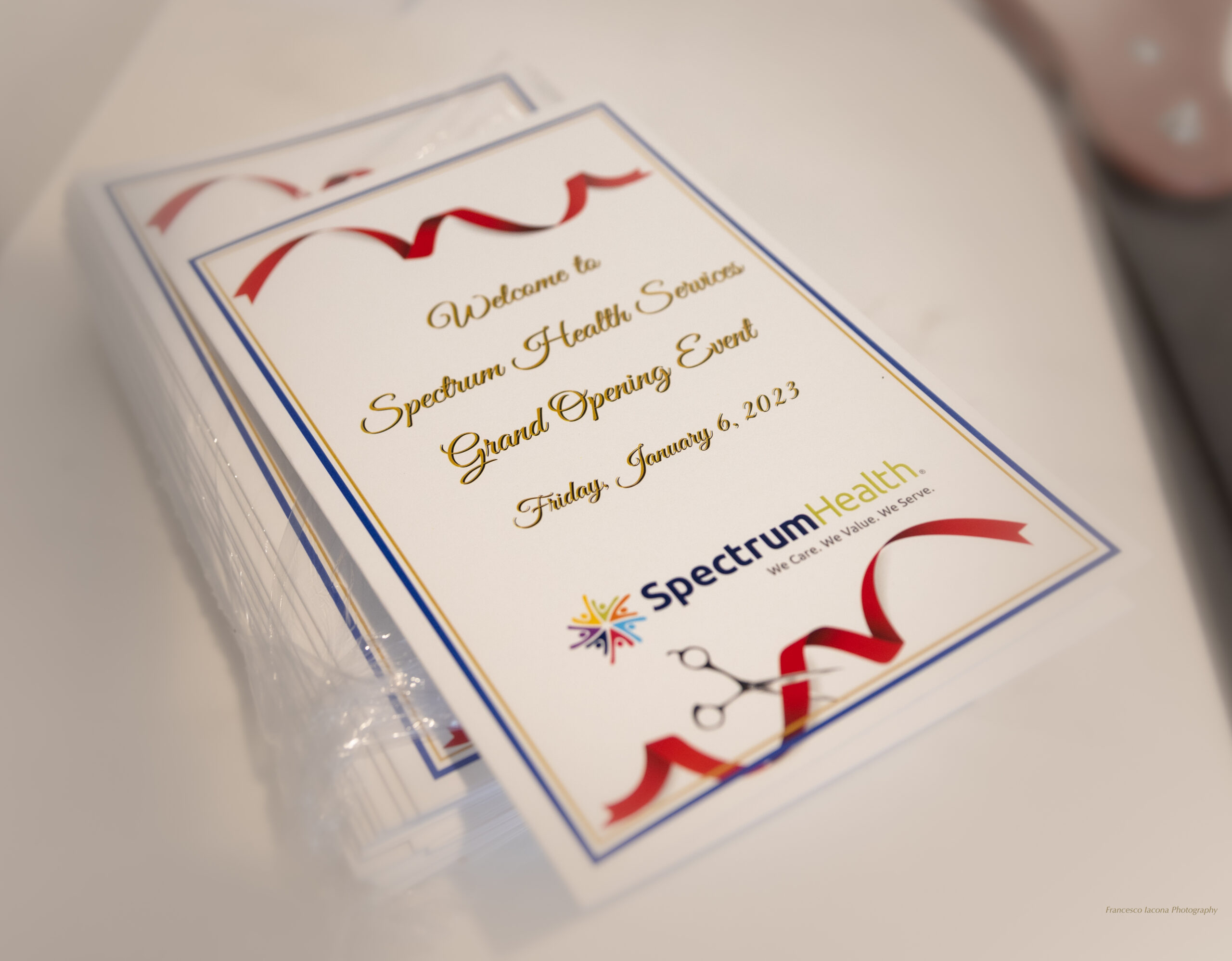 Grand opening programs on a table