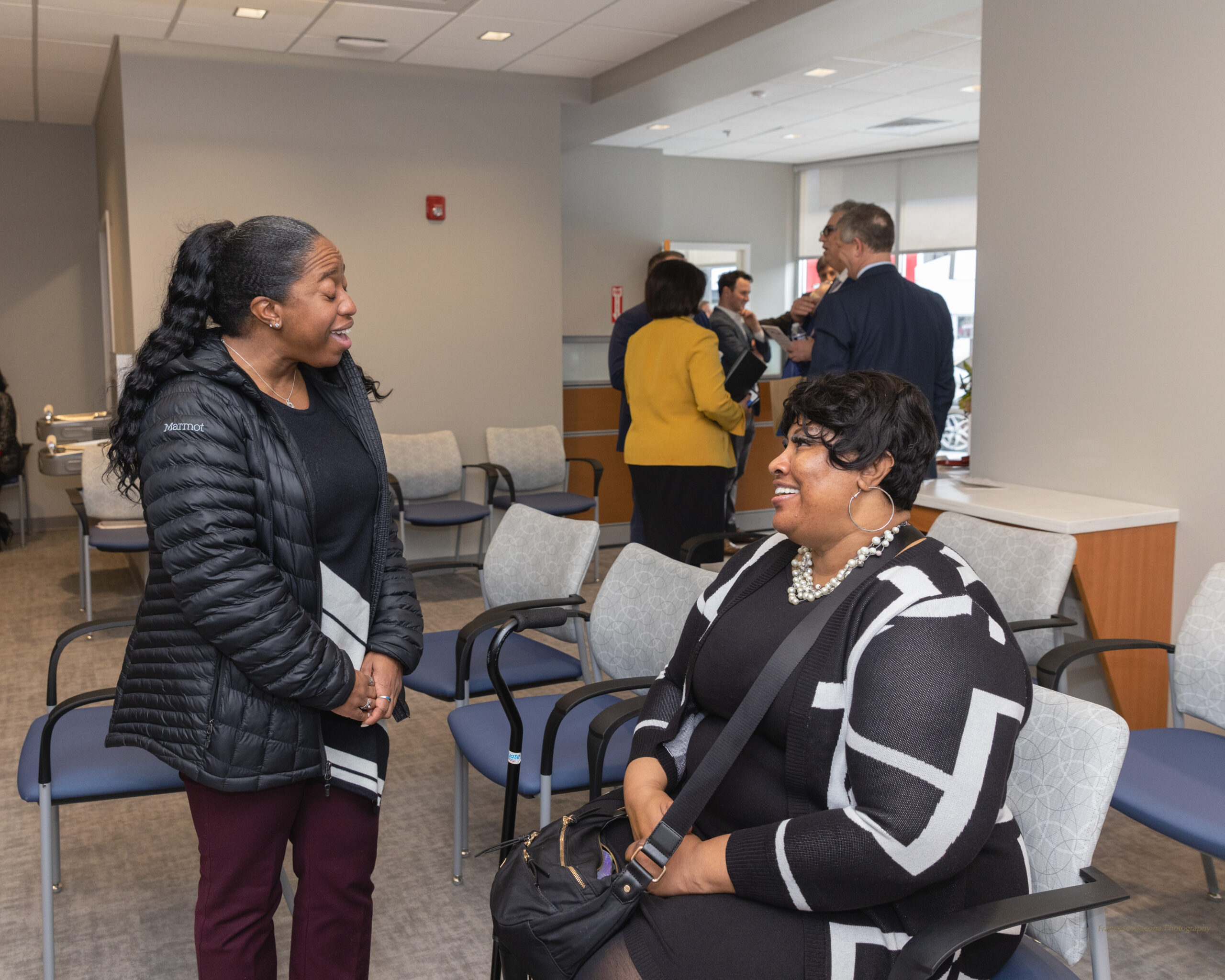 Guests talk in the new center’s waiting room