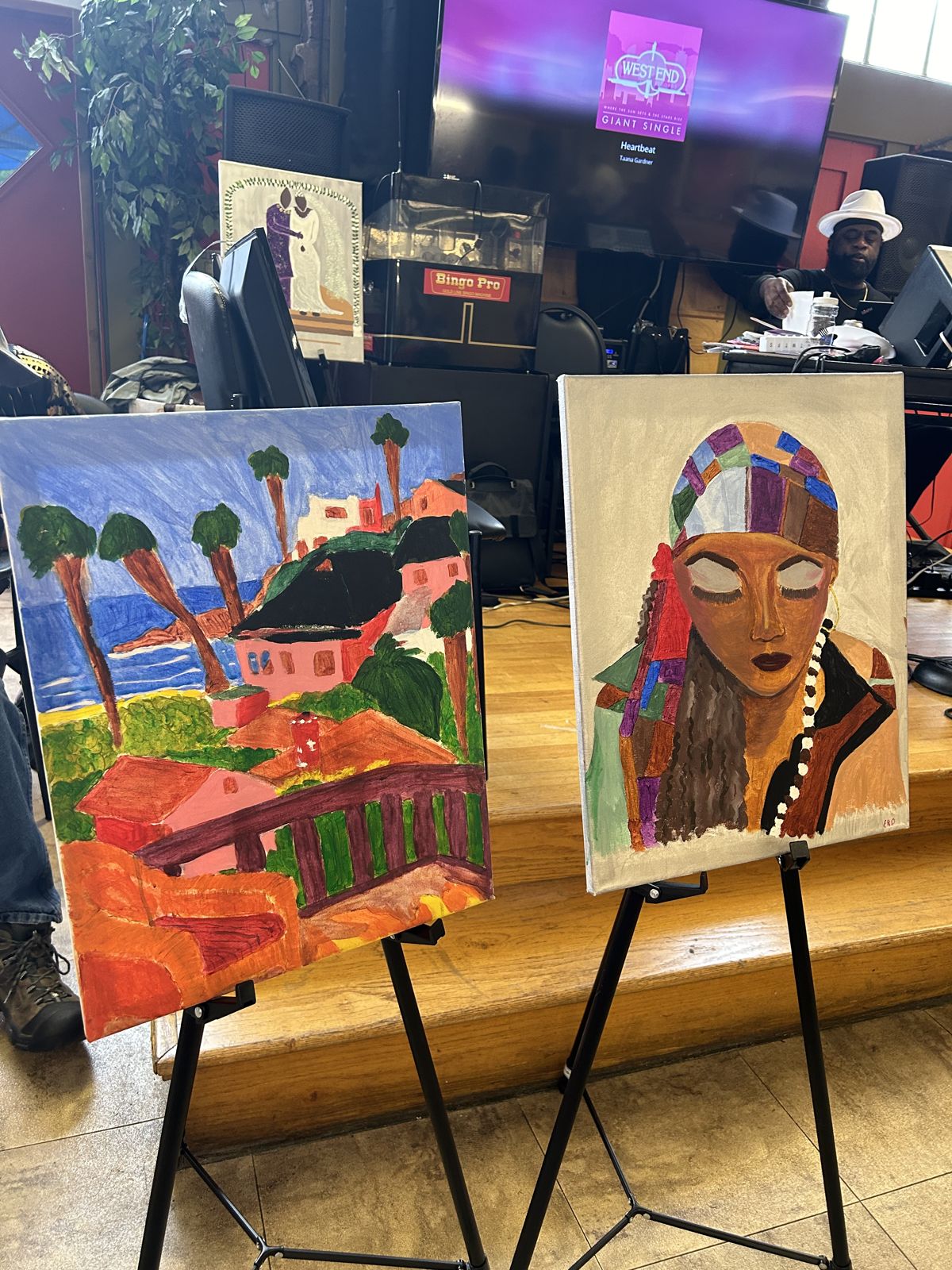 Paintings on easels at the health fair