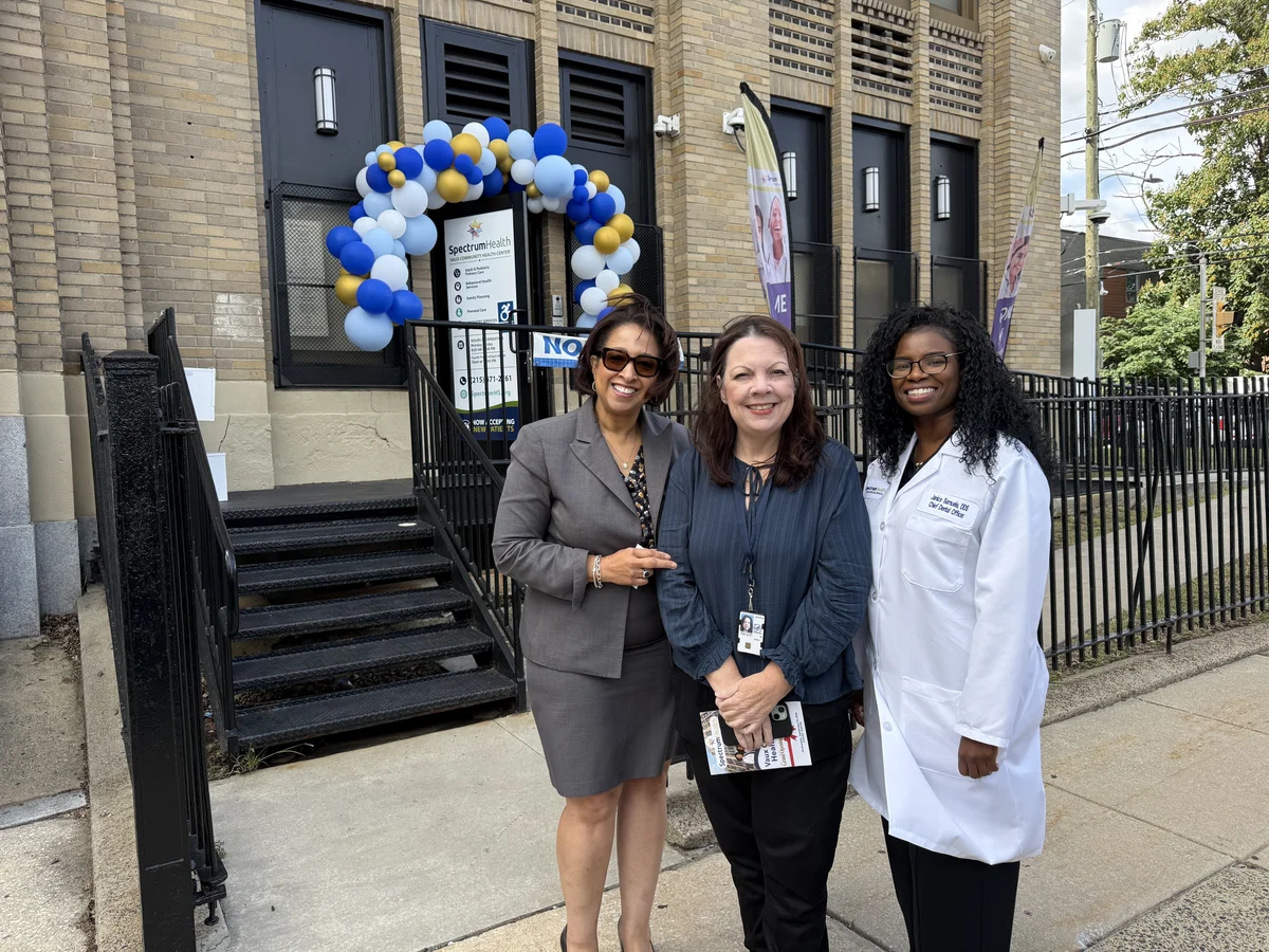 Spectrum leaders outside the new Vaux Community Health Center on grand opening day